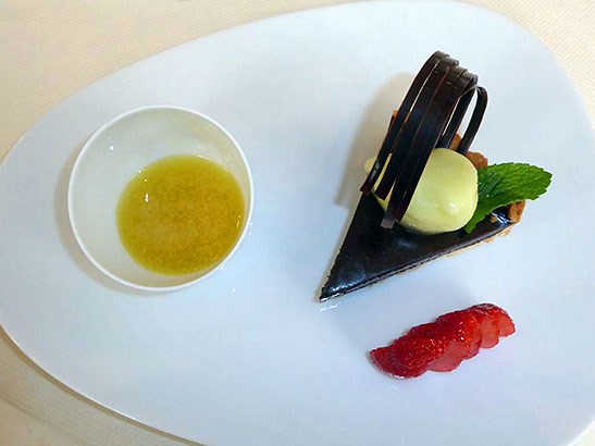 dark chocolate tart with yuzu sauce and green apples sorbet