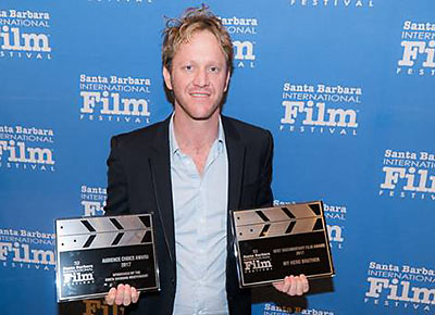 Israeli filmmaker Yonatan Nir with his two awards at the Santa Barbara Film Festival