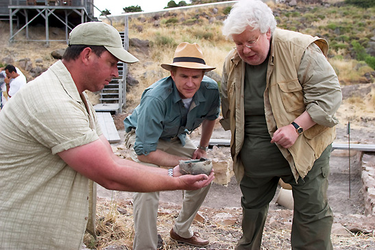 Matthew Modine & Richard Griffiths digging up archeological items in a scene from OPA!