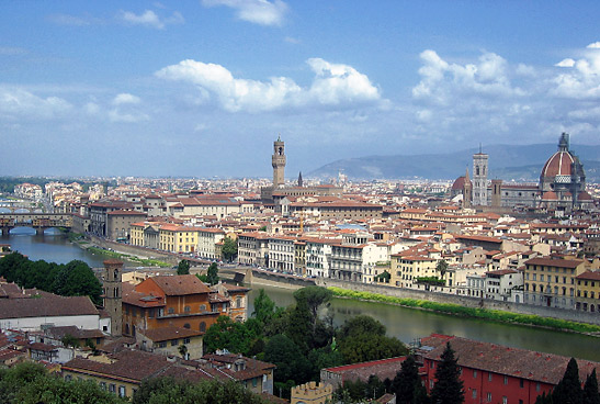 the historic center of Florence with the Florence Cathedral at right and the Arno River in the foreground