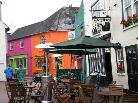 restaurant in Kinsale with brightly painted houses in the background