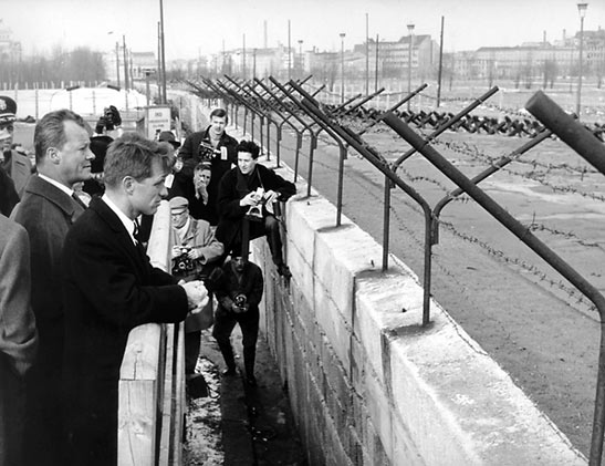 Robert F. Kennedy visiting the Berlin Wall in the 1960s