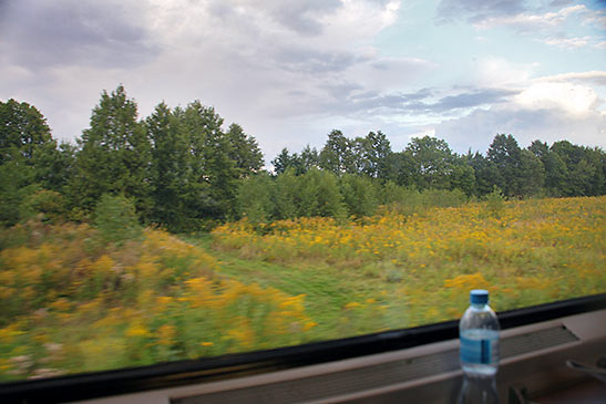 view of countryside on Eurail train from Warsaw to Berlin