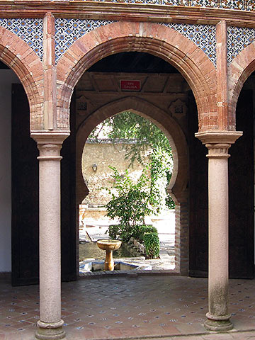 a garden courtyard showing a traditional mix of Moorish and Spanish design