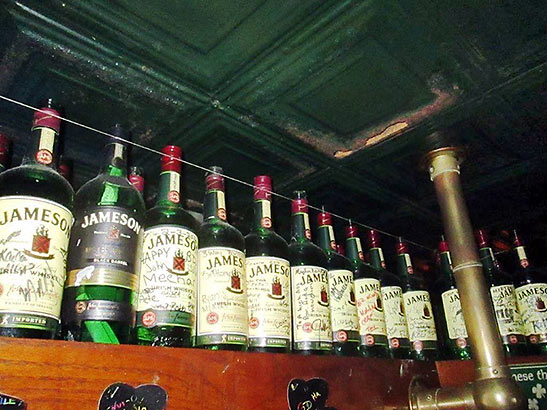 liquor bottles held in place by wires, Meehan's Irish Pub