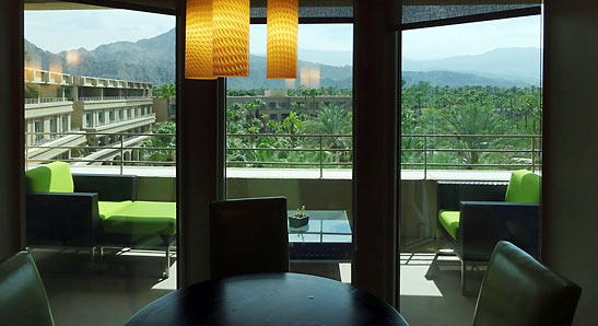 view of the hotel grounds and nearby mountains from the penthouse suite