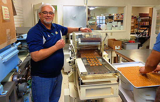 owner Kim Jensen showing the writer how they make their world famous chocolate