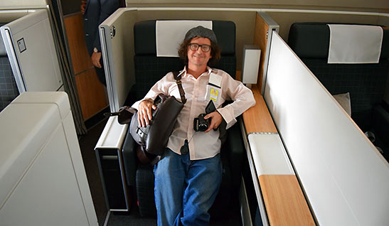 writer at the first class cabin of a Boeing 777-300ER