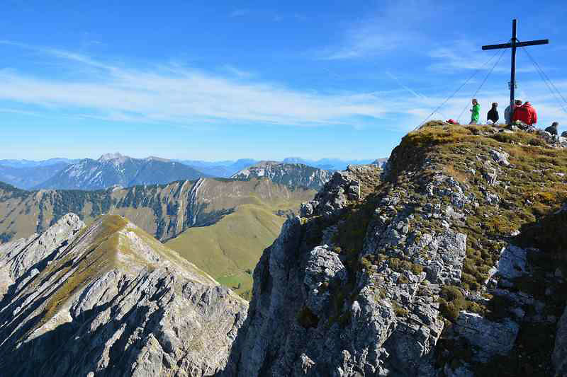 trekkers at a peak in the Karwendel Range