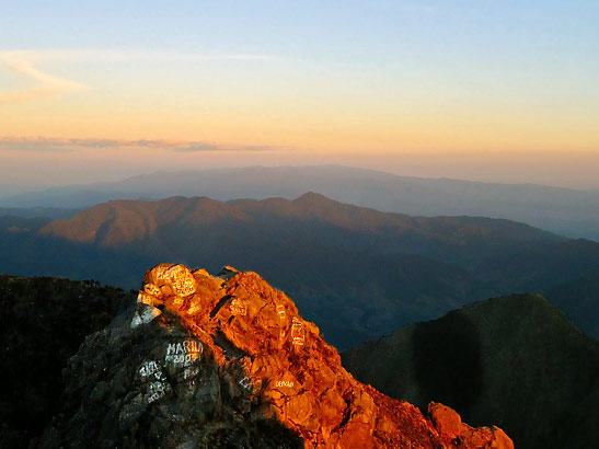 mountains of Costa Rica at sunrise in the background viewed from the summit of Volcan Baru, Panama