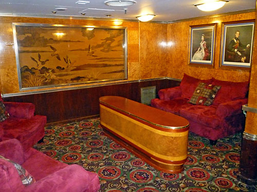 art deco furniture and paintings at a lounge inside the Queen Mary