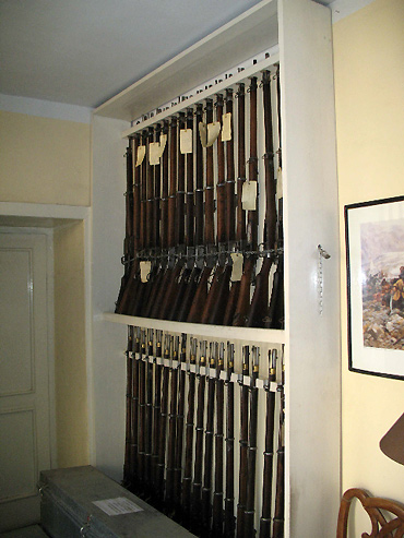 a gun rack at the Gandamack Lodge