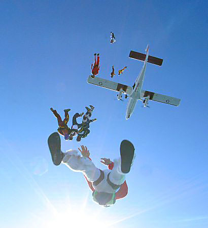 skydivers jumping from plane