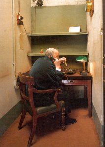 wax figure of Churchill at his desk