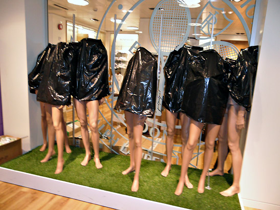 dummy models draped over with black plastic bags at the Wimbledon Gift Shop