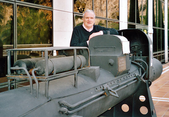 writer with World War 2 Italian 2-man Miale Mk 1 submarine at the Monaco Naval Museum