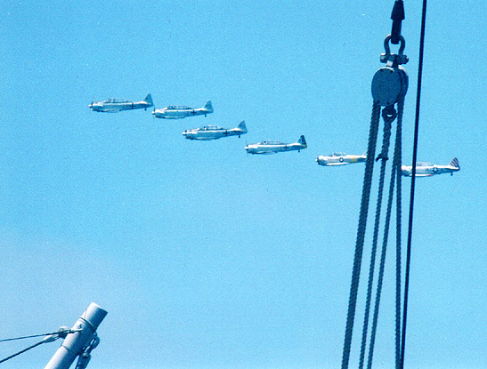 AT-6 squadron flying over the Lane