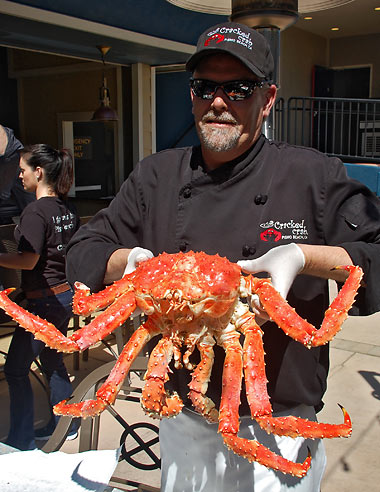 Chef Mike McGourty with a king crab
