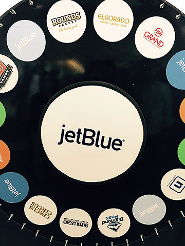 Jet Blue wheel of fortune at the gate of first flght to Reno