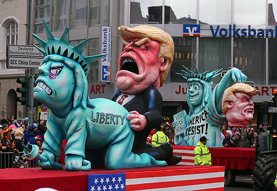 floats of Trump and the Statue of Liberty at a Dusseldorf parade