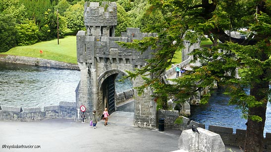 narrow stone bridge leading to Ashford Castle