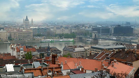 the Danube flows through Budapest with the Chain Bridge on the right