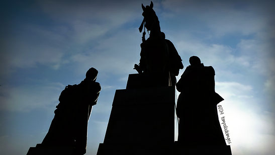 statue of King Wenceslas IV, Bohemia's patron saint, silhoutted against the sky