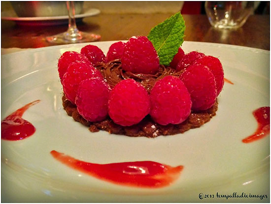 dessert at the Le Clos Mirande: thin crispy of triple thick dark chocolate surrounded by fresh raspberries