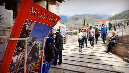 Mostar tourist guidebook with the Stari Most in the background