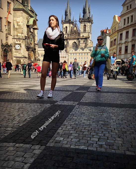 walking along the cobble of Prague's Old Town Square