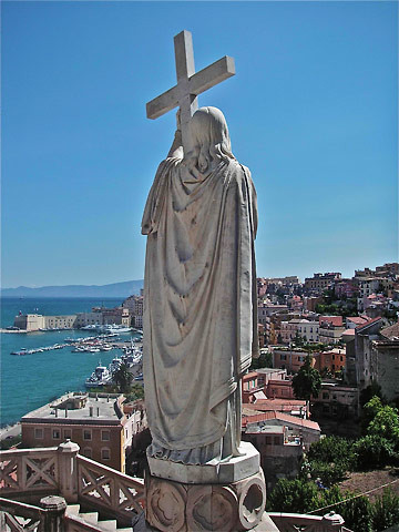 statue of an angel overlooks the harbor in Gaeta's medieval center