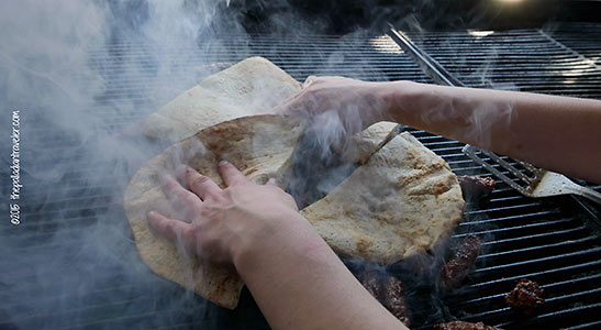 grilling meat and pita bread