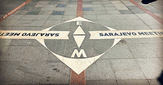the symbolic east-west demarcation line on a flagstone alleyway in Old Town Sarajevo