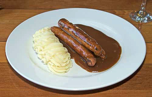 a plate of bangers and mash