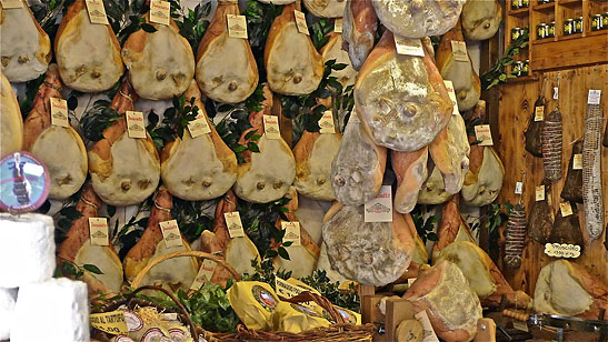 prosciutto on display