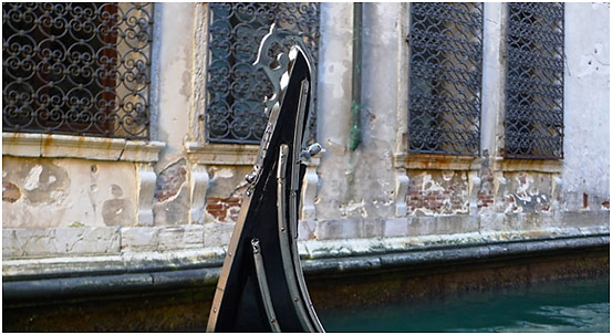 view of a building along the Grand Canal from a gondola, Venice