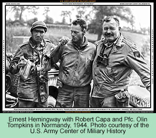 Ernest Hemingway, Robert Capa and Pfc. Olin Tompkins in Normandy, 1944