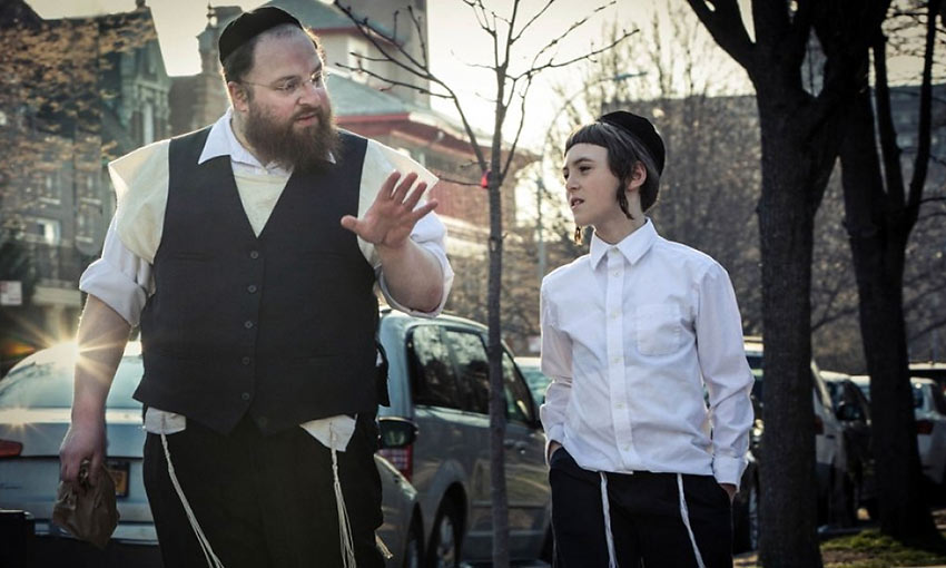 Menashe with his son Rieven played by Ruben Niborski