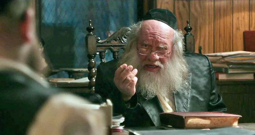 Menashe played by Menashe Lustig with his rabbi