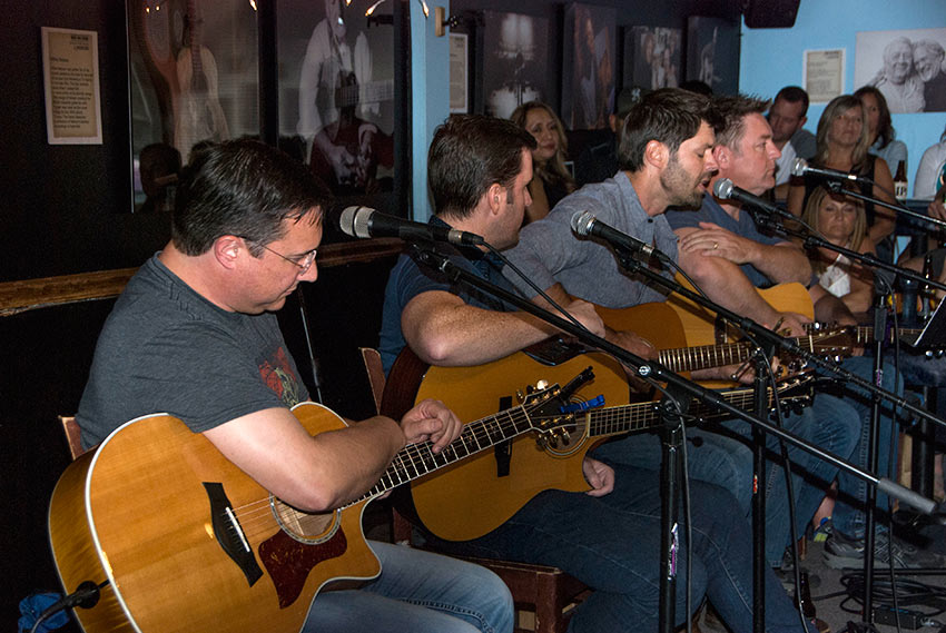 performers inside the Bluebird Cafe