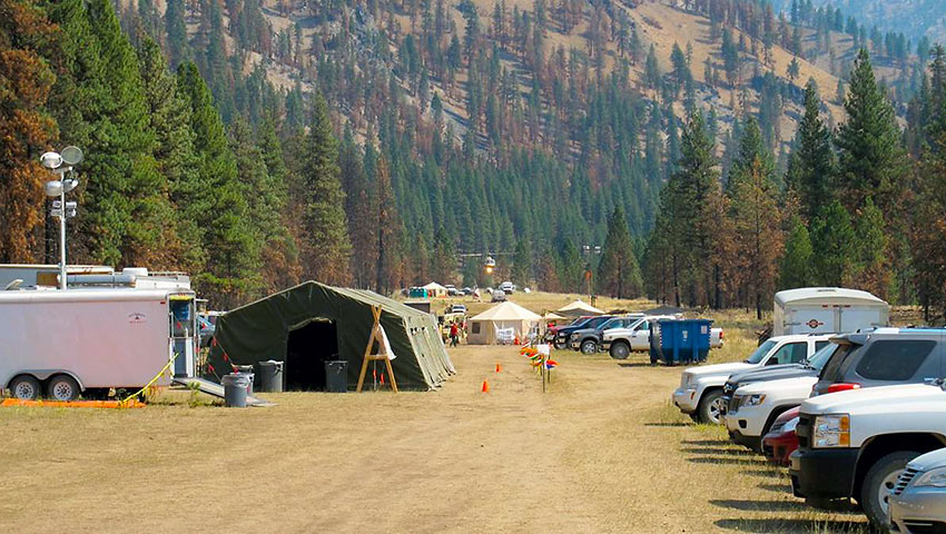 helicopter leaving the fire camp