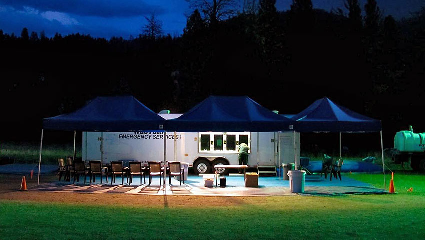 dusk at a fire camp set-up