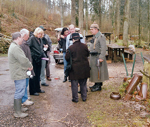 colorful Frenchman in a WW1 German Uniform with visitors at Camp Moreau