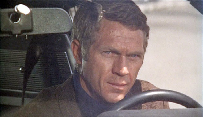 Steve McQueen inside a car in Bullitt