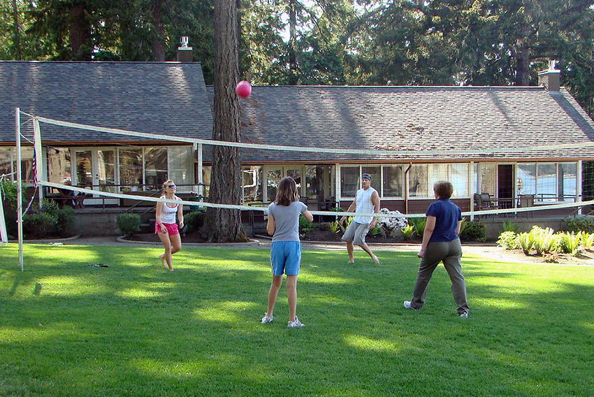 playing volleyball at the grounds of a hotel