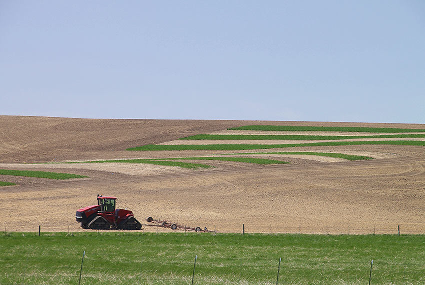 combine on a Palouse field