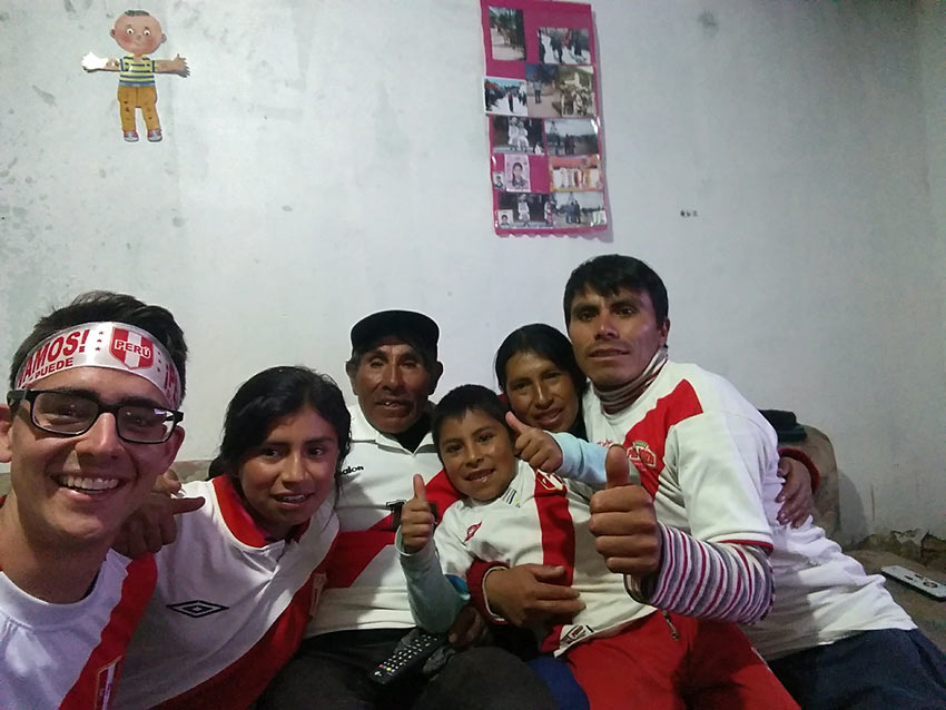 the writer watching the World Cup with his host family