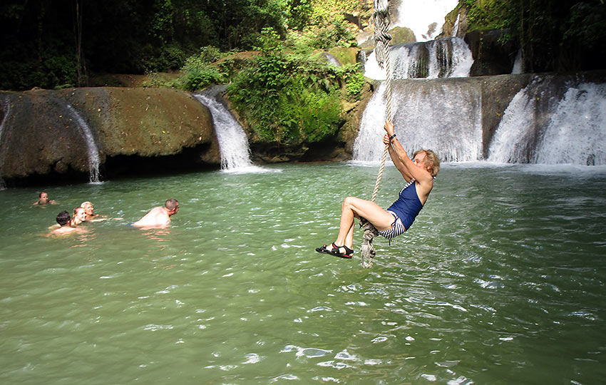 writer swinging into the YS Falls basin