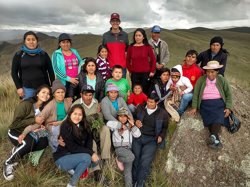 author with extended family in Huaricolca, Peru