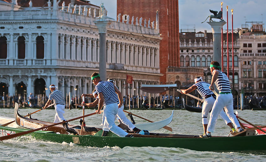 rowers and gondolas at a regatta, Venice